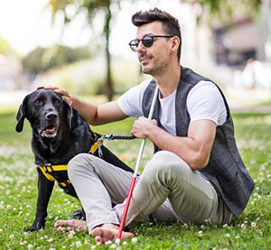 Blind Man With Seeing Eye Dog